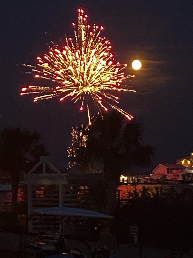 fourth of july fireworks with a full moon