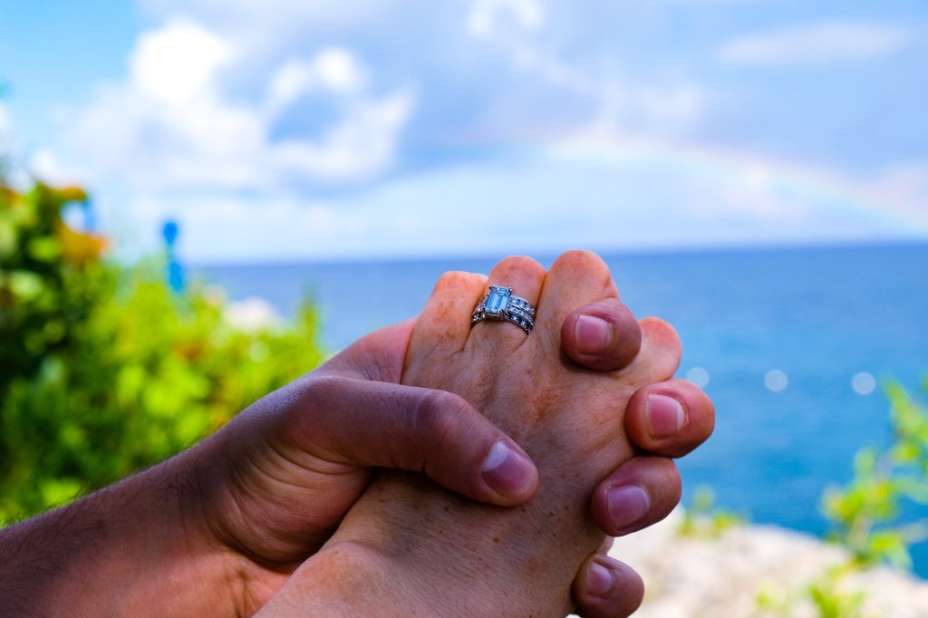 new wedding rings and a rainbow at the rockhouse hotel